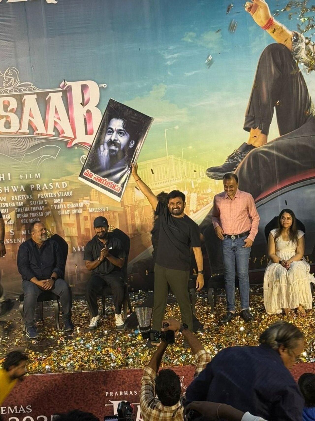 While Prabhas did not grace the event, director Maruthi was seen holding a picture of Prabhas declaring him as the hero on his film